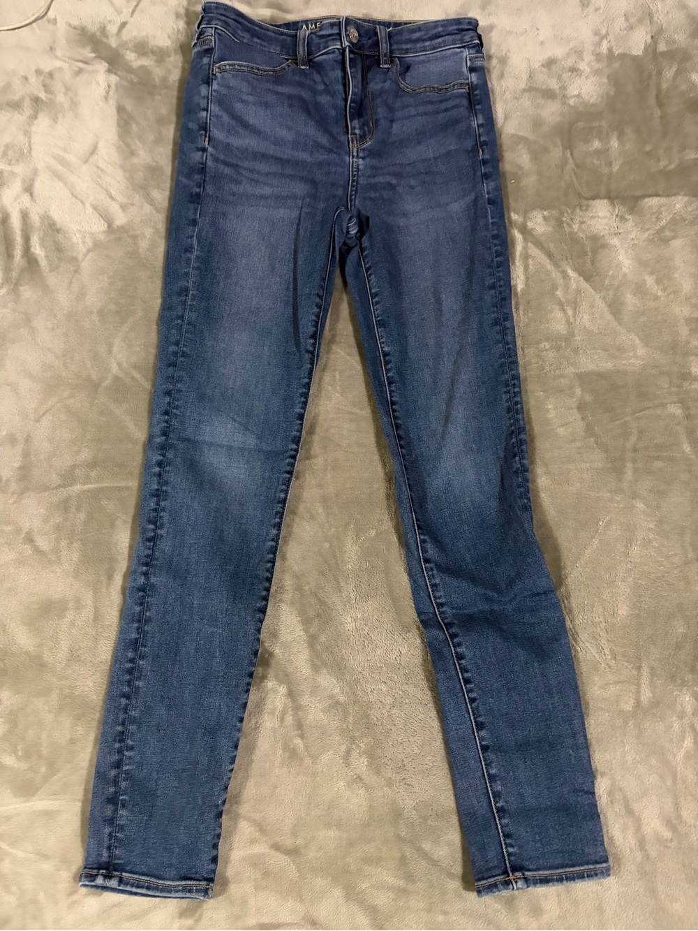Size 8 long American Eagle Outfitters Blue Skinny Jeans/High rise jegging